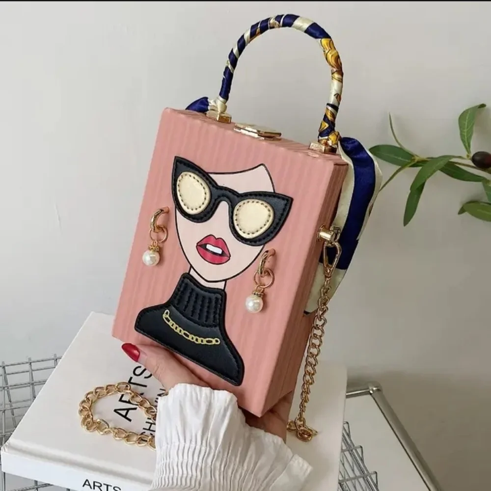 Trendy Pink Graphic Clutch with Gold Accents